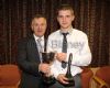 Rackard Coady presents Aidan Corbett with the Paddy Hamilton Memorial Cup