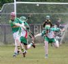 Creggan's Liam McCann gets the ball away despite James Morgan's block skills