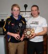 Richie Hogan presents Harry Kilgore with the  North Antrim Feile B trophies